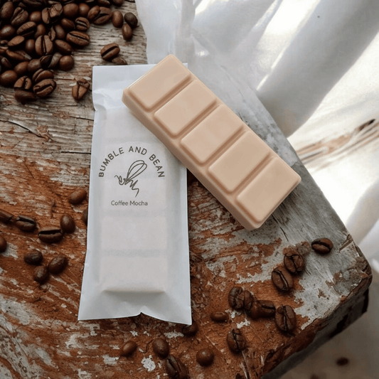 Coffee Mocha wax melts displayed with coffee beans for a cosy, café-inspired home fragrance