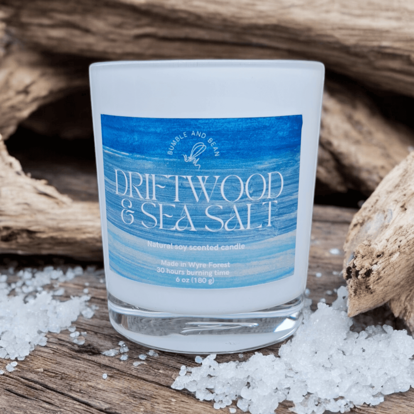 Close-up of Driftwood and Sea Salt candle with cotton wick and smooth natural wax
