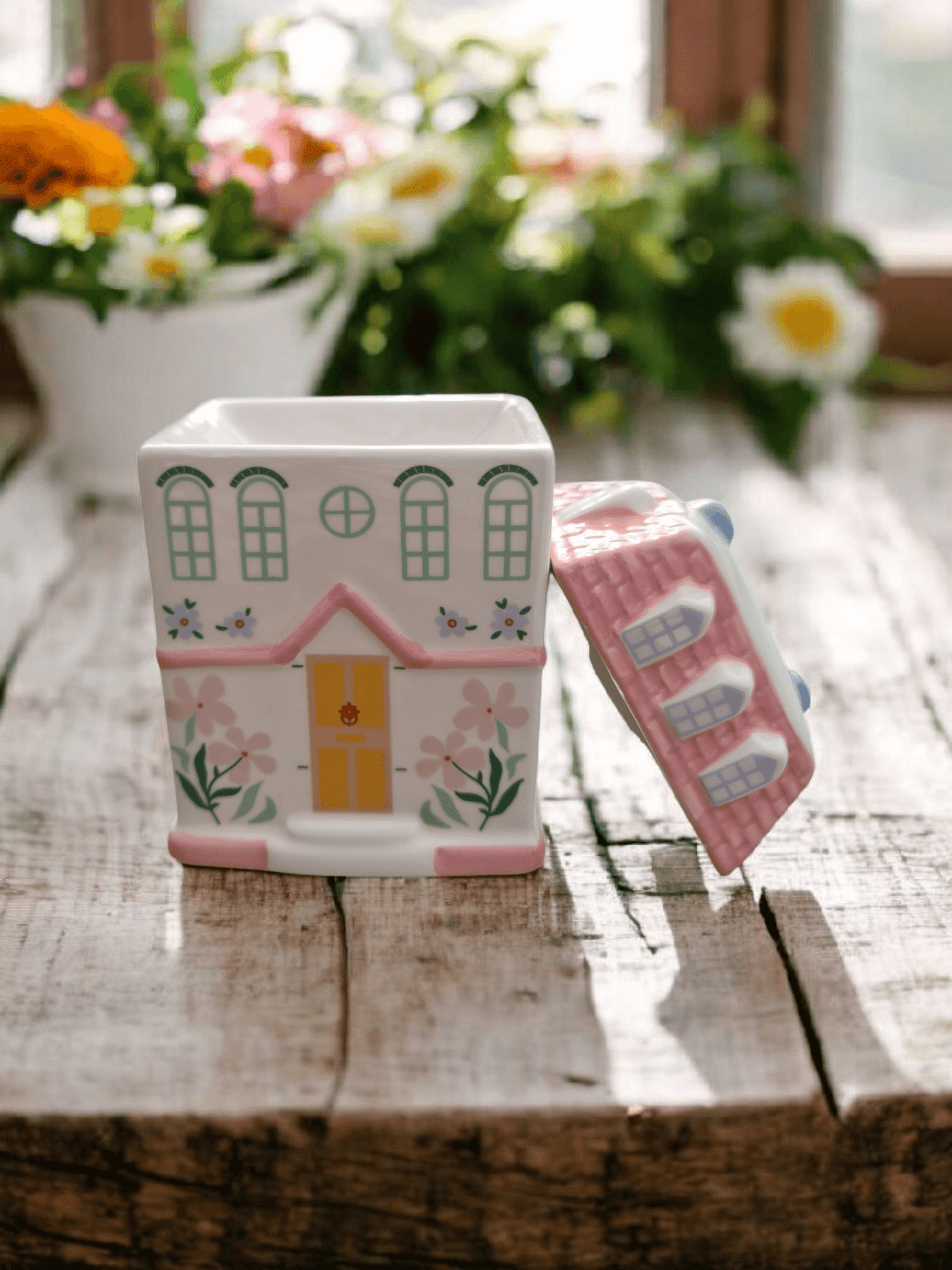 Whimsical cottage wax melt burner displayed with fairy lights and cosy décor for a cottage core vibe