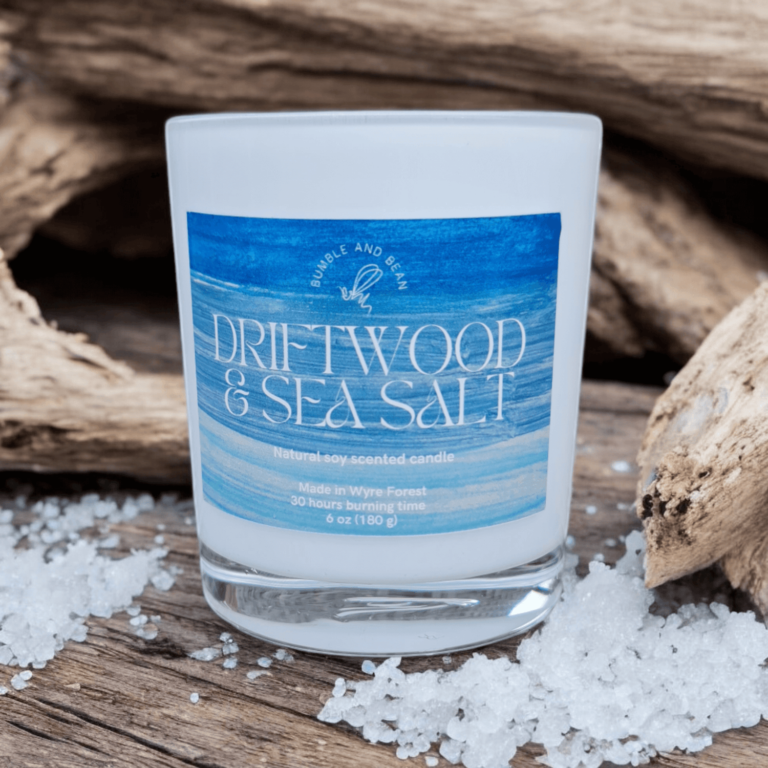 Close-up of Driftwood and Sea Salt candle with cotton wick and smooth natural wax