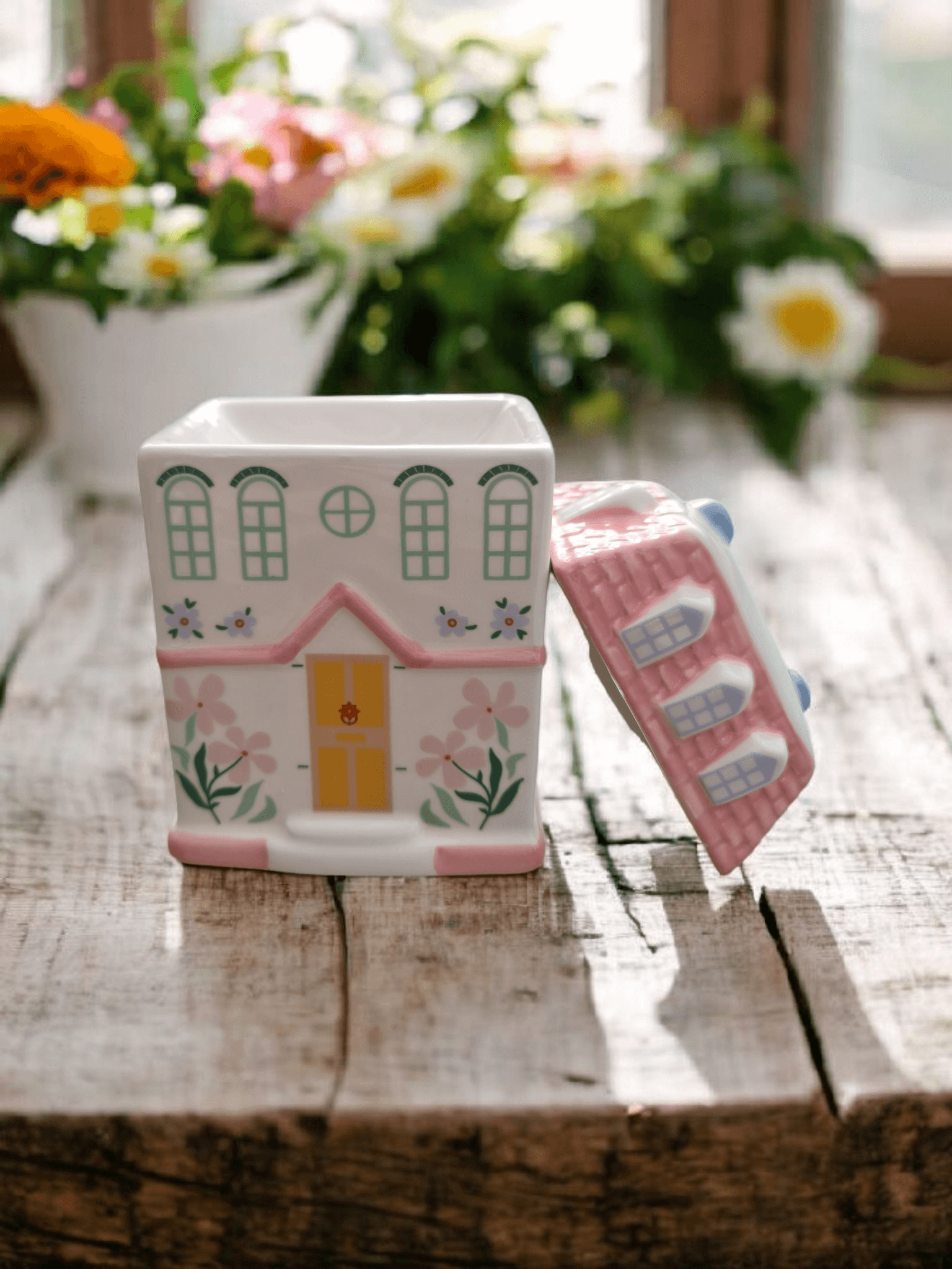 Whimsical cottage wax melt burner displayed with fairy lights and cosy décor for a cottage core vibe